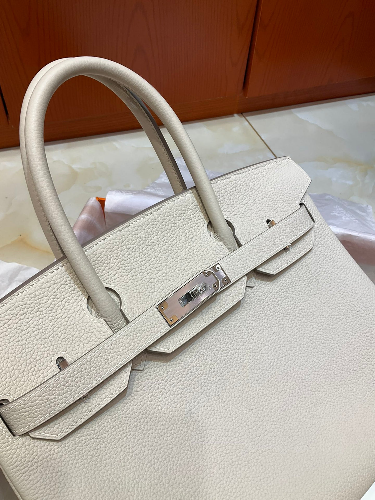Milkshake White Structured Handbag With Silver Plated Turn Lock and Dual Rolled Top Handles